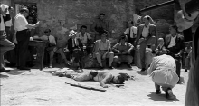 Francesco Rosi (left, in white shirt) on the movie set of “Salvatore Giuliano”